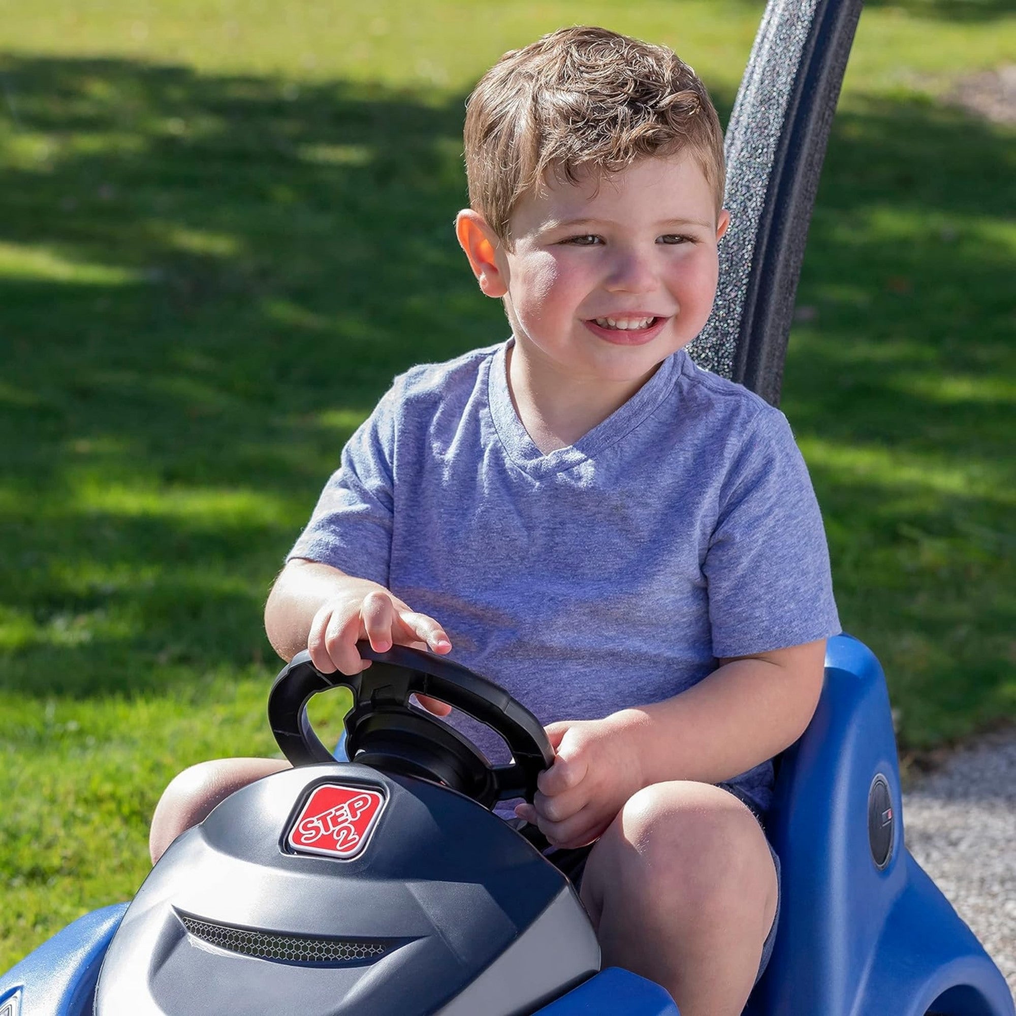 Step2 Buggy GT, Single Seater Kids Push Car, Easy to Store Ride On Toy with Seatbelt, Horn and Storage Trunk, Suitable for Children both Boys and Girls Aged 18m and Above, Pink, Red, Blue